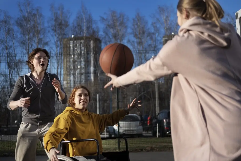 woman-wheelchair-playing-basketball-side-view
